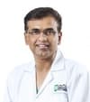 Dr. Milind Thakur